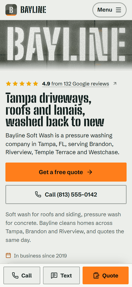 Phone screenshot of the sample pressure washing website for Bayline Soft Wash, a fictional business in Tampa, FL, style A